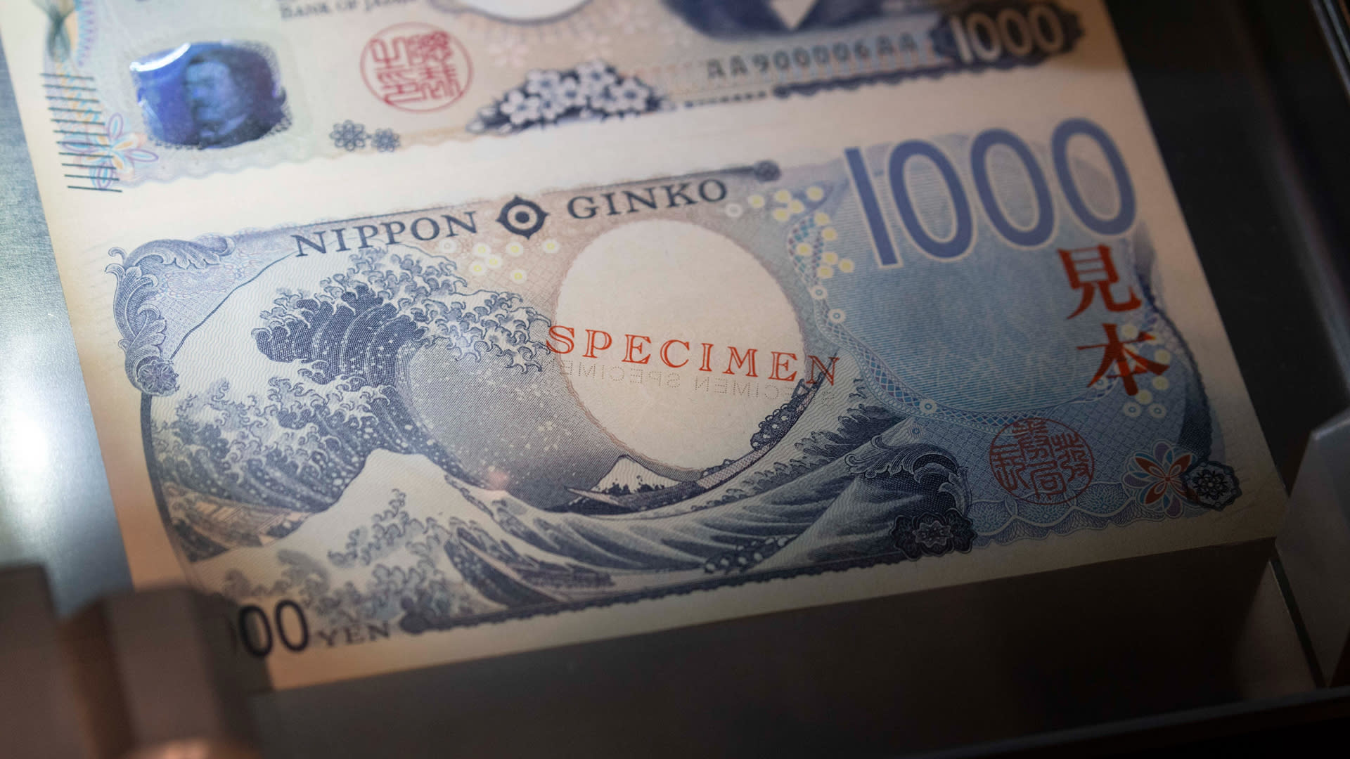 Dynamic illustration of JPYC stablecoin tokens with Japanese yen banknotes and government bonds representing Japan's regulated digital finance sector in 2025.