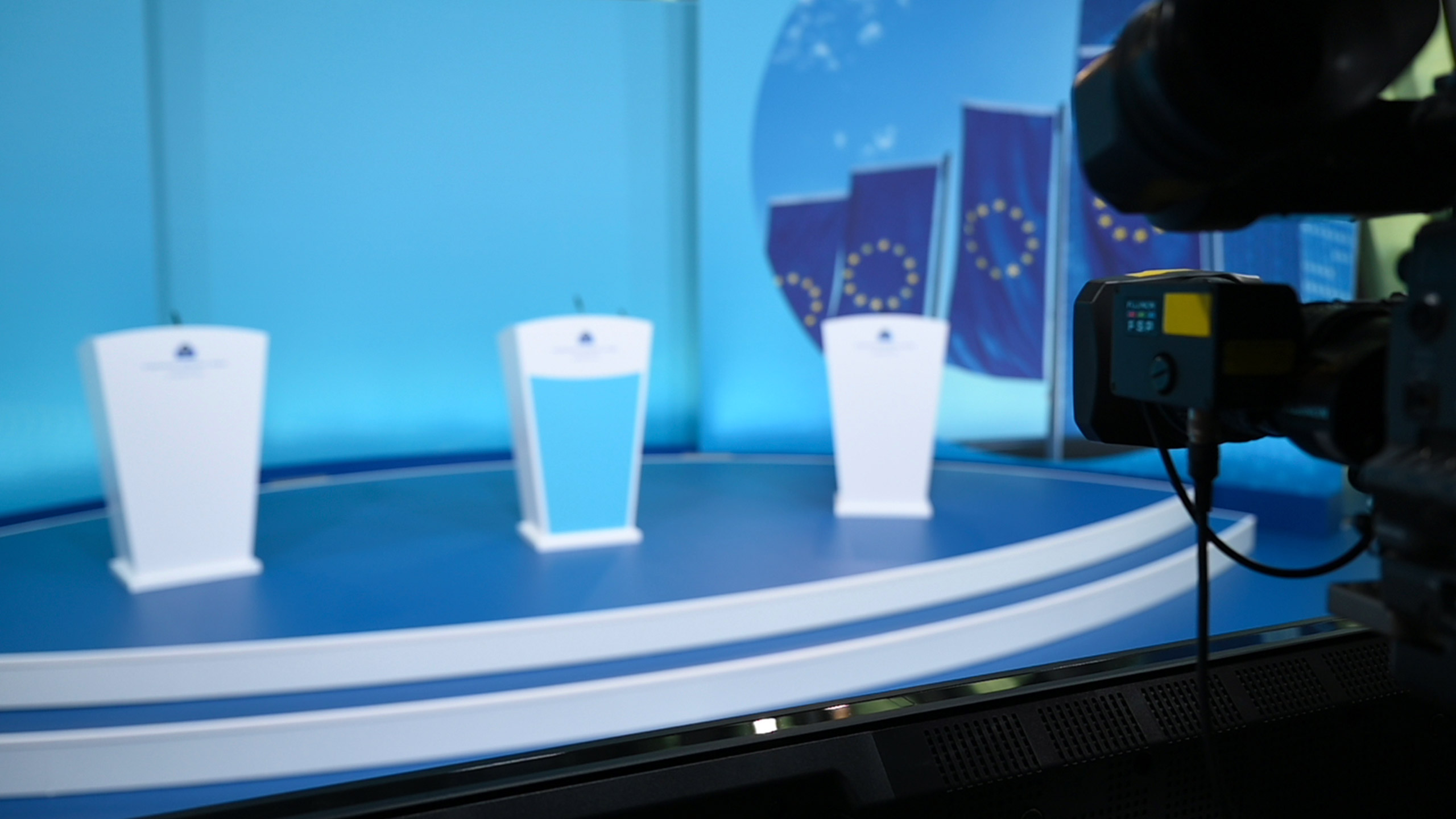 Collage of EURA, EUROC, EURT, agEUR, and PAR stablecoin logos with the European Parliament in the background, representing top euro-pegged stablecoins in 2025.